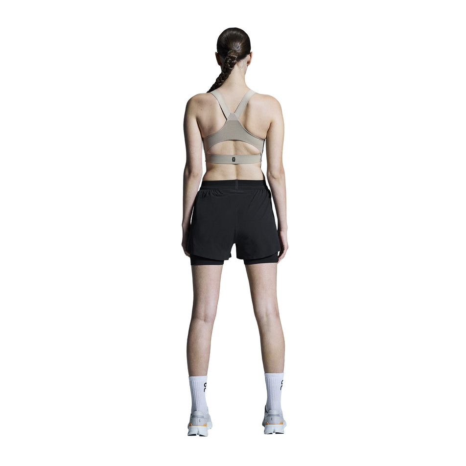 Back view of a model wearing the On Women's 3