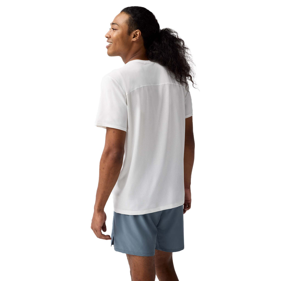 Back view of a model wearing the Brooks Men's Atmosphere Short Sleeve 3.0 in the White/Shadow Stripe colourway. (8718765129890)