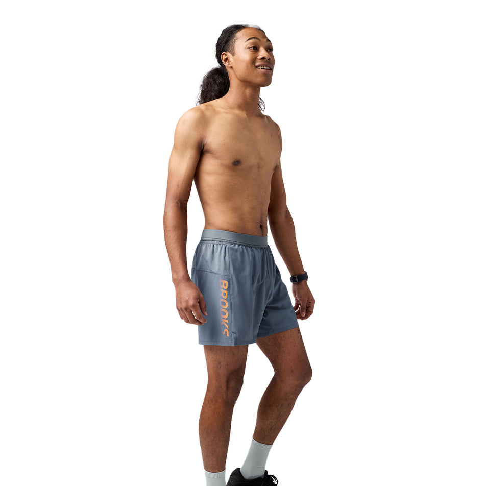 Angled view of a model wearing the Brooks Men's Journey 5