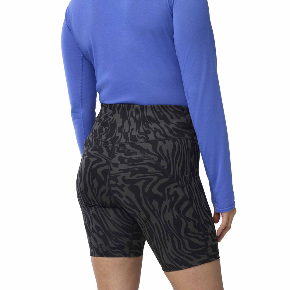 Back view of a model wearing the Brooks Women's Spark 8