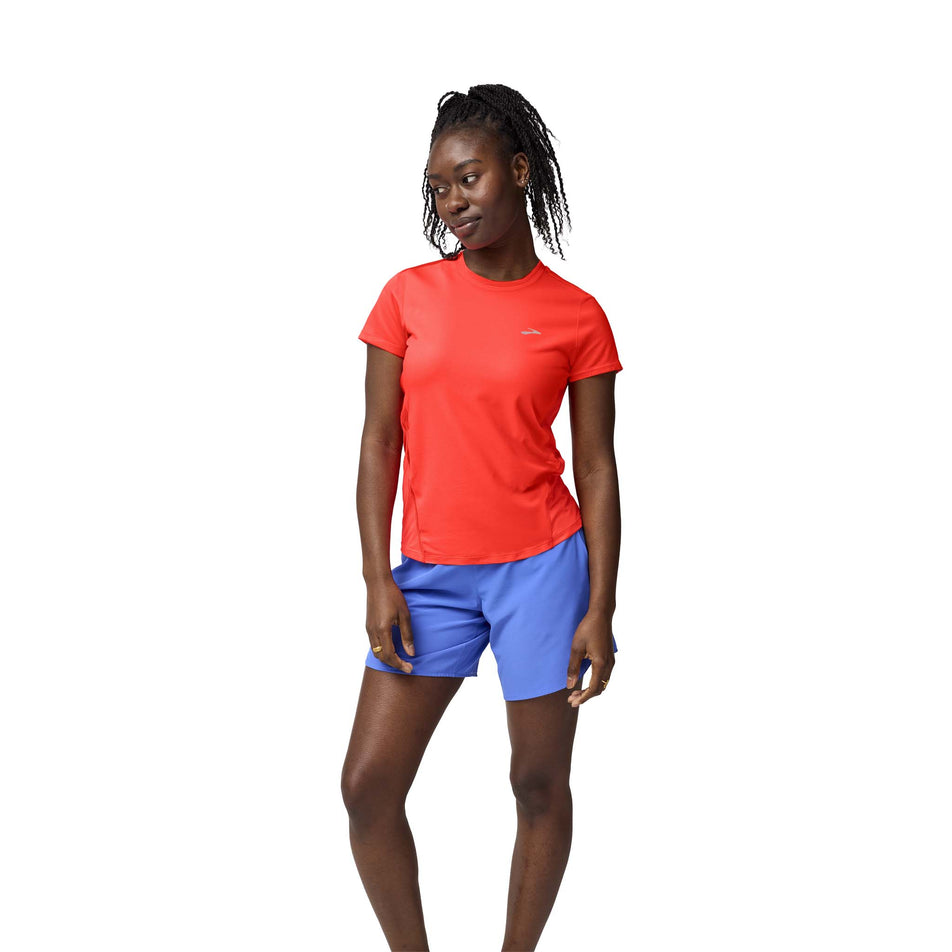 Front view of a model wearing the Brooks Women's Sprint Free Short Sleeve 3.0 in the Neo Cayenne colourway. (8575025676450)