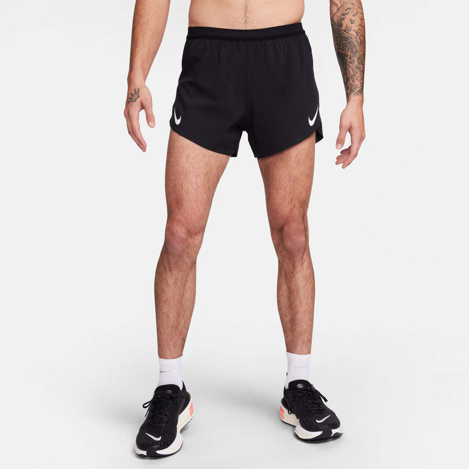 Front view of a model wearing a pair of Nike Men's AeroSwift Dri-FIT ADV 4