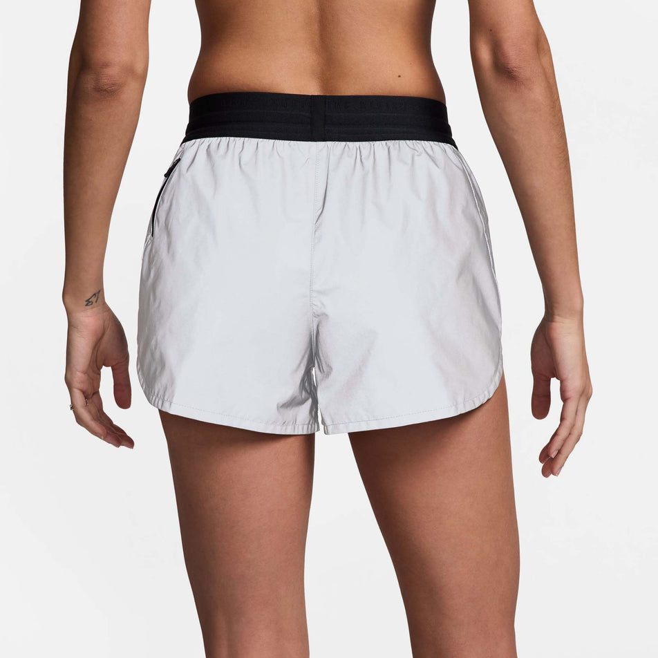 Back view of a model wearing a pair of Nike Women's Running Division 3