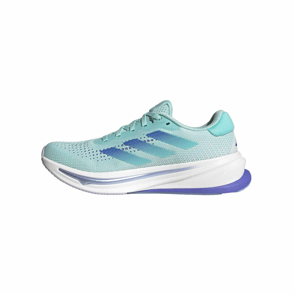 Medial side of the right shoe from a pair of adidas women's Supernova Rise Running Shoes in the Semi Flash Aqua/Cobalt Blue/Blue Spark Met. colourway (8472646156450)