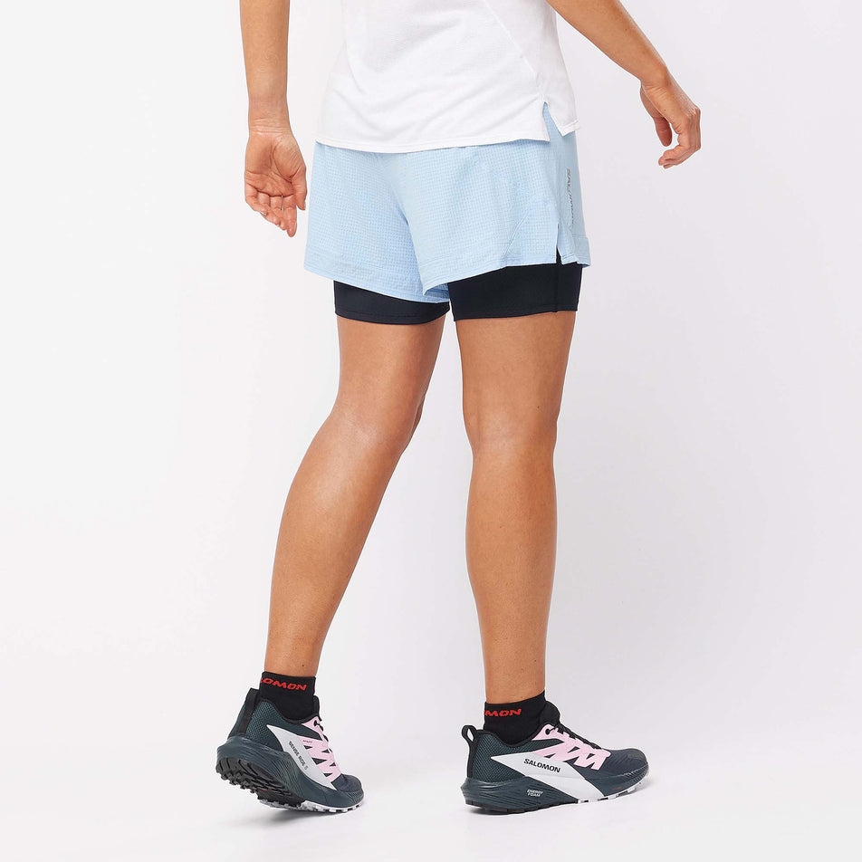 Back view of a model wearing a pair of Salomon in the Chambray Blue/Deep Black colourway (7892306952354)