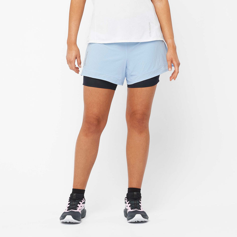 Front view of a model wearing a pair of Salomon in the Chambray Blue/Deep Black colourway (7892306952354)