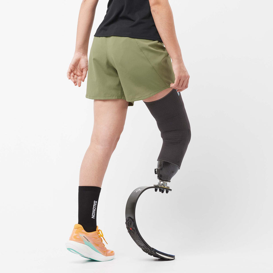 Back view of a model wearing a pair of Salomon Women's Cross 5