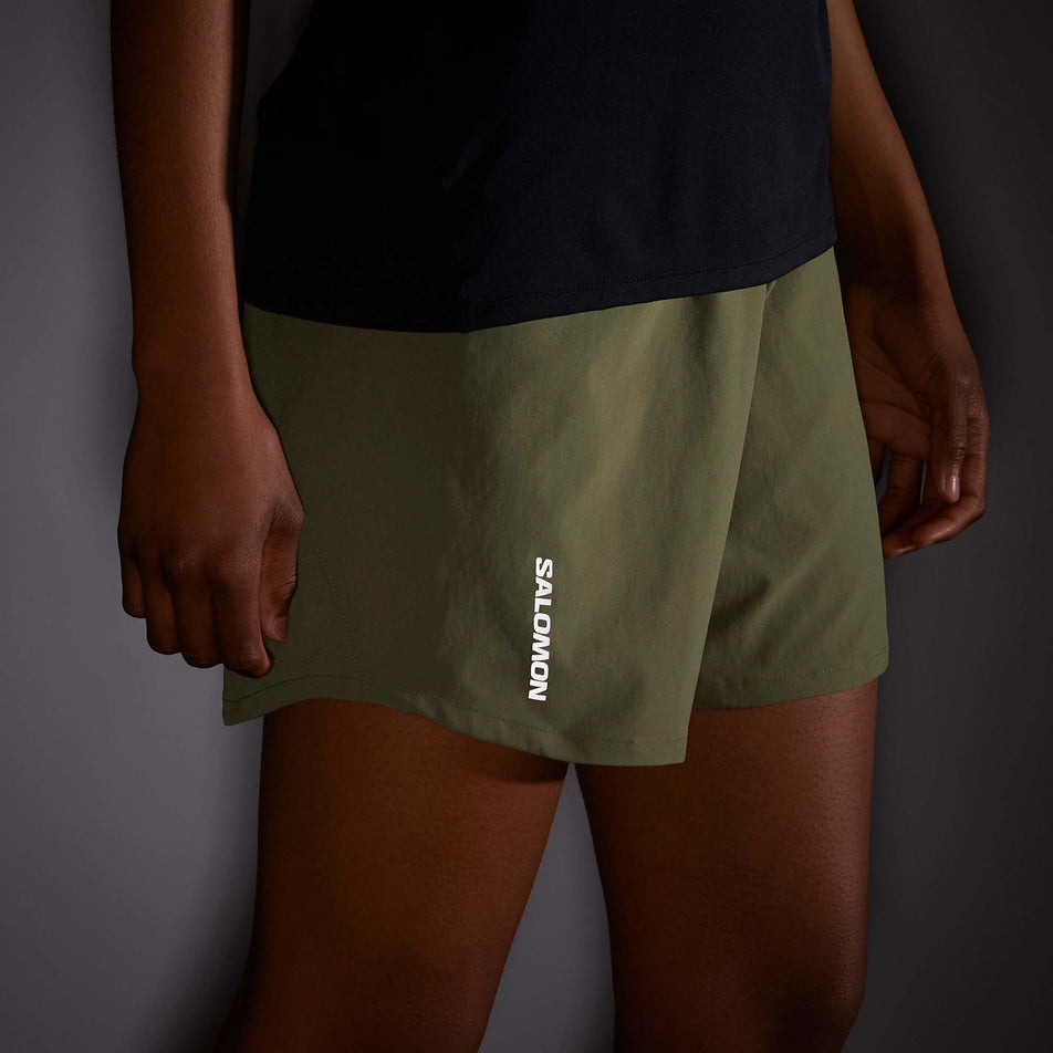 A model wearing a pair of Salomon Women's Cross 5