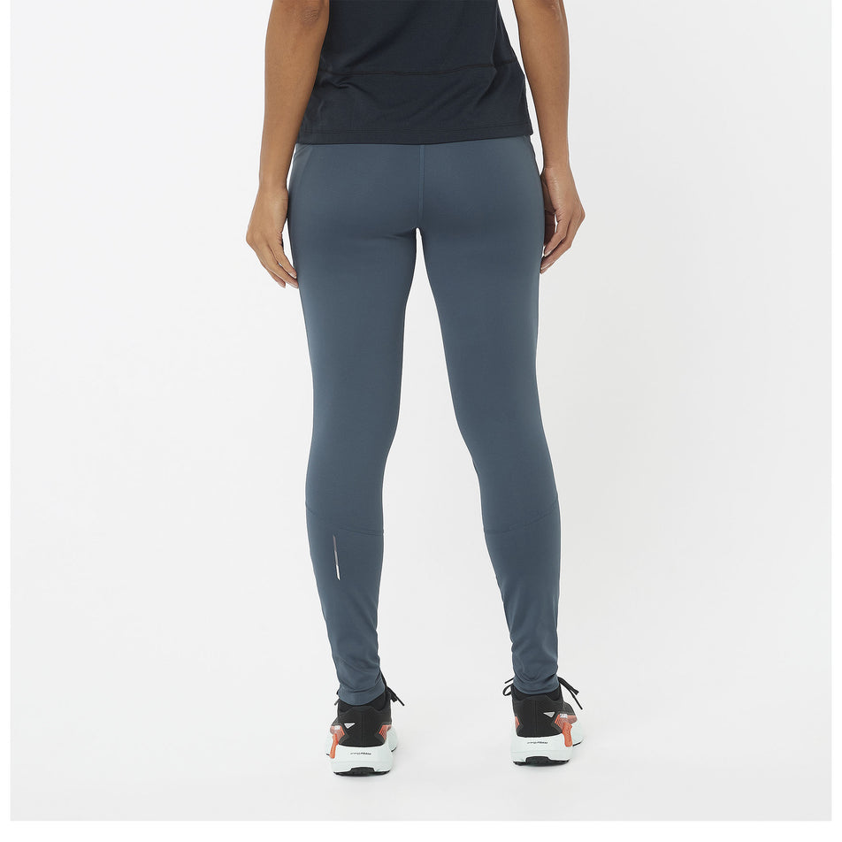 Back view of a model wearing a pair of Salomon Women's Cross Run 28