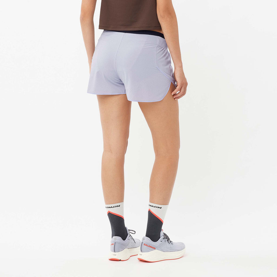 Back view of a model wearing the Women's Salomon Sense Aero 3