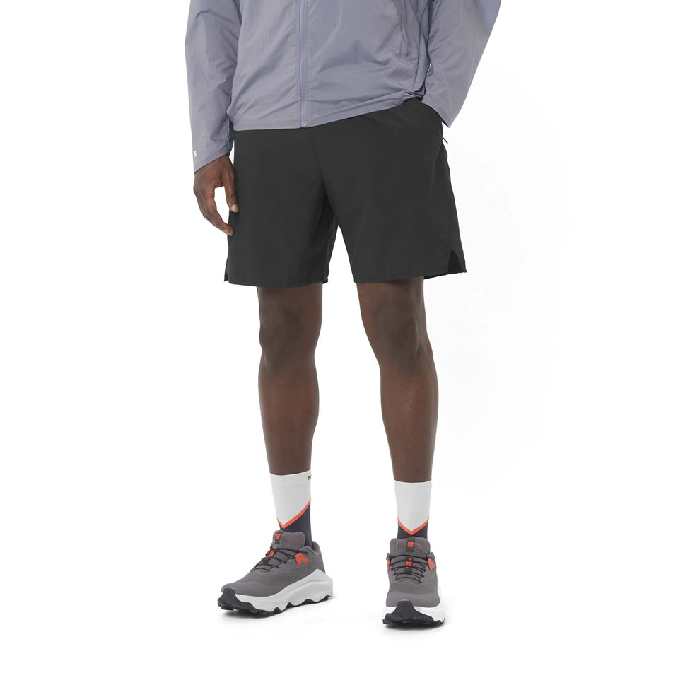 Front view of a model wearing the Salomon Men's SHKout Core 2in1 7