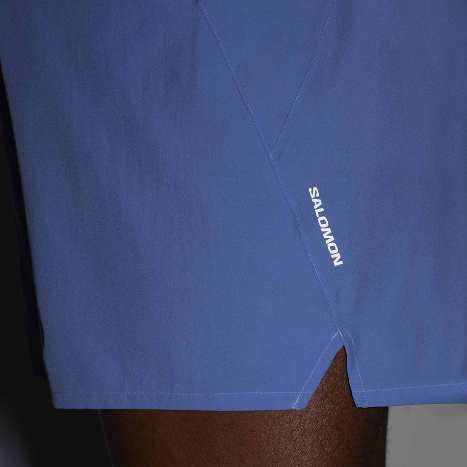 The reflective Salomon logo on the side of the Salomon Men's SHKout Easy 5