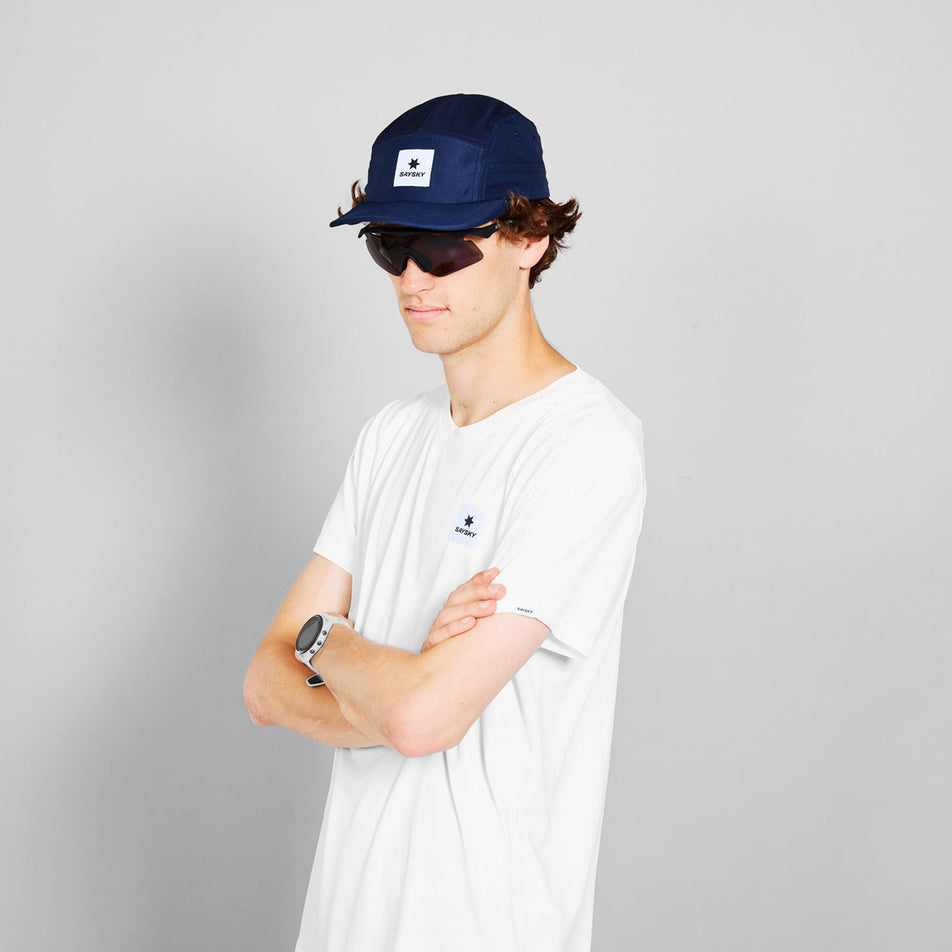 Front view of a model wearing the SAYSKY Unisex Combat Cap in the Blue colourway. (8731006337186)