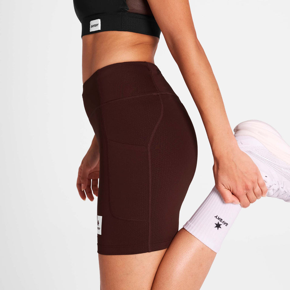 Side view of a model wearing the SAYSKY Women's Combat+ Short Tights 7