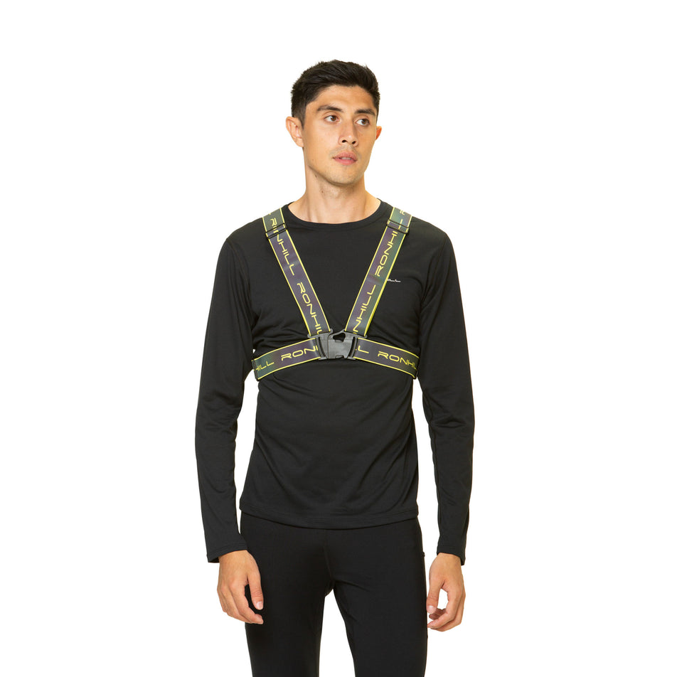 Front view of a model wearing the Ronhill Unisex Reflect Belt in the Fluo Yellow/Reflect colourway. Model is also wearing leggings and a top.  (8491318313122)