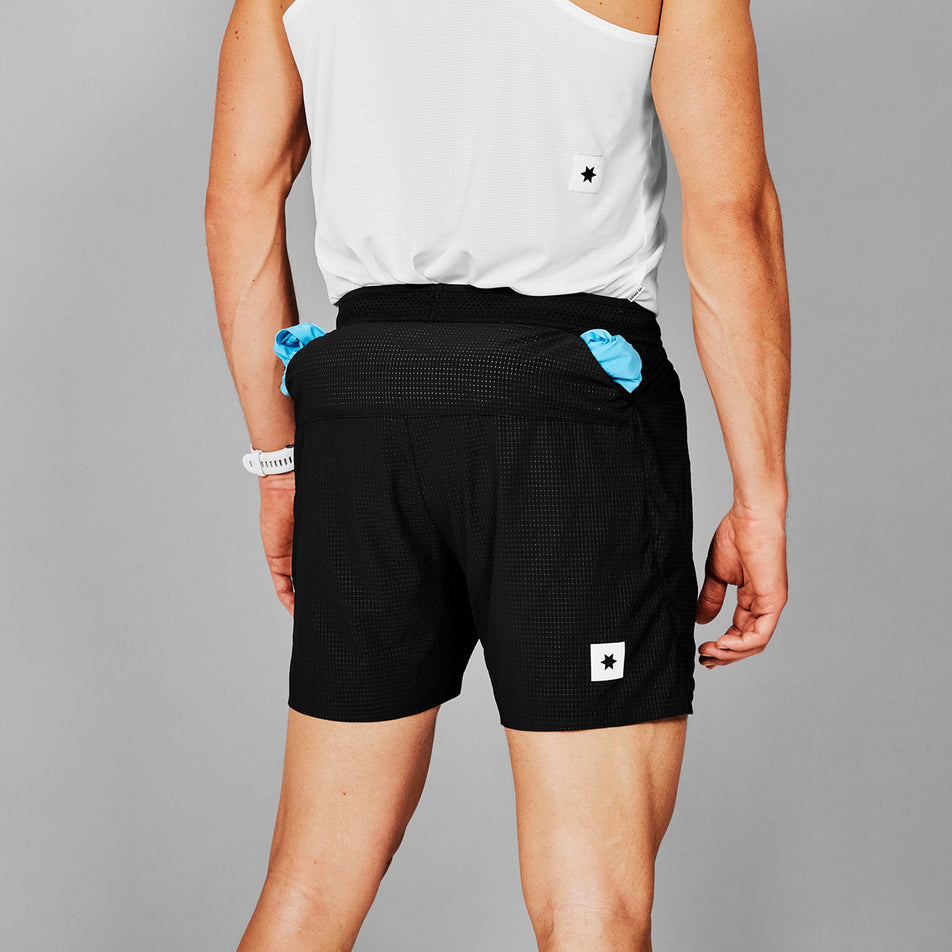 Back view of a model wearing a pair of SAYSKY Men's Flow Shorts 5