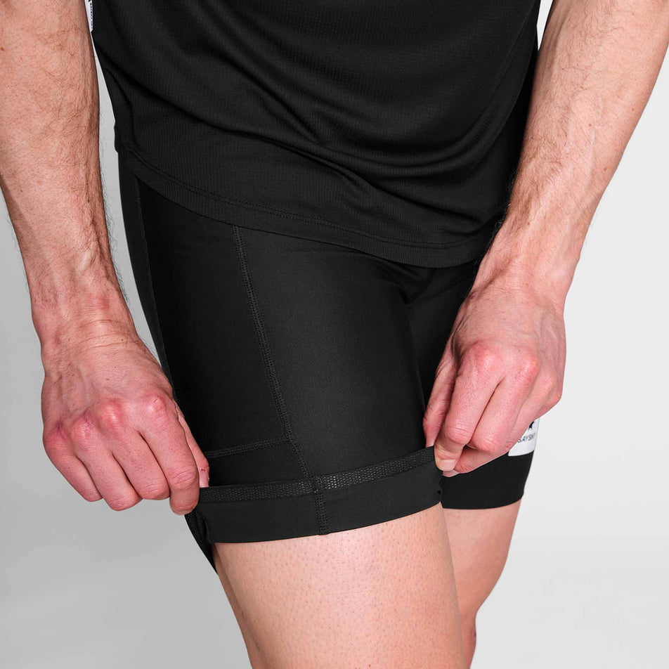 A model showing the gripper design at the end of the leg on the SAYSKY Men's Flow+ Race Short Tights 7